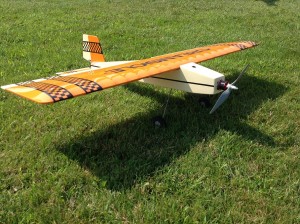 Front 3/4 View of John Harpers Stick 600 Creamsicle
